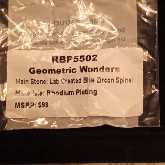 Beautiful ring geometric wonders lab created blue zircon spinale rhodium plating - Picture 5 of 5